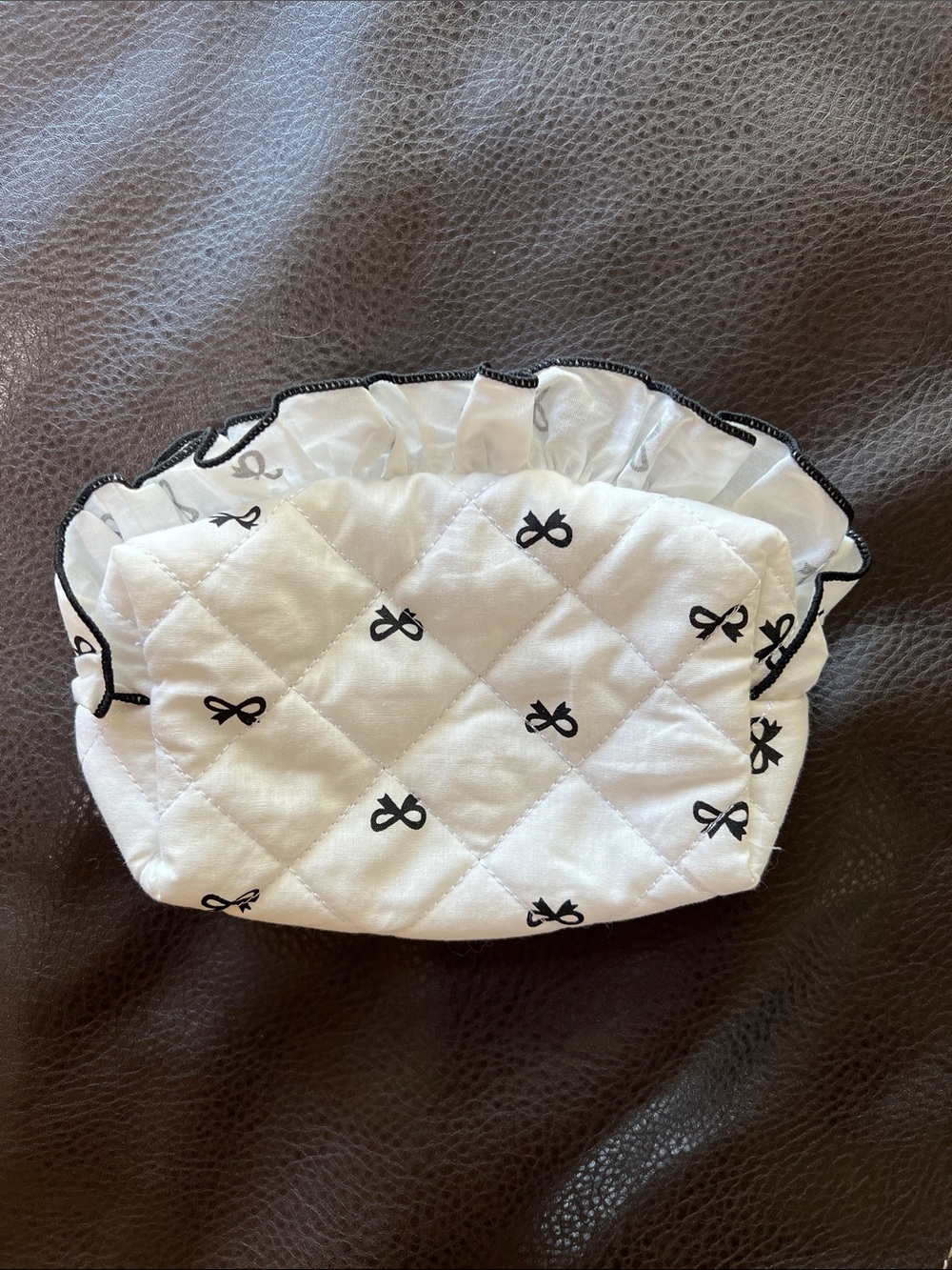 NWOT White Quilted Pouch with Black Bow Print